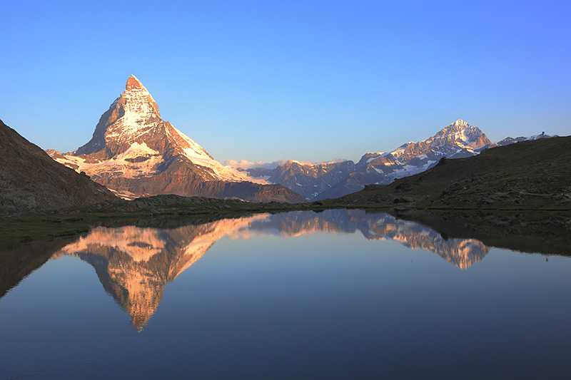 mount-matterhorn-matterhorn-peak-and-reflection-on-riffelsee-in-switzerland